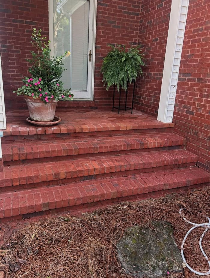 Clean red-brick steps and columns after brick cleaning in Athens, GA