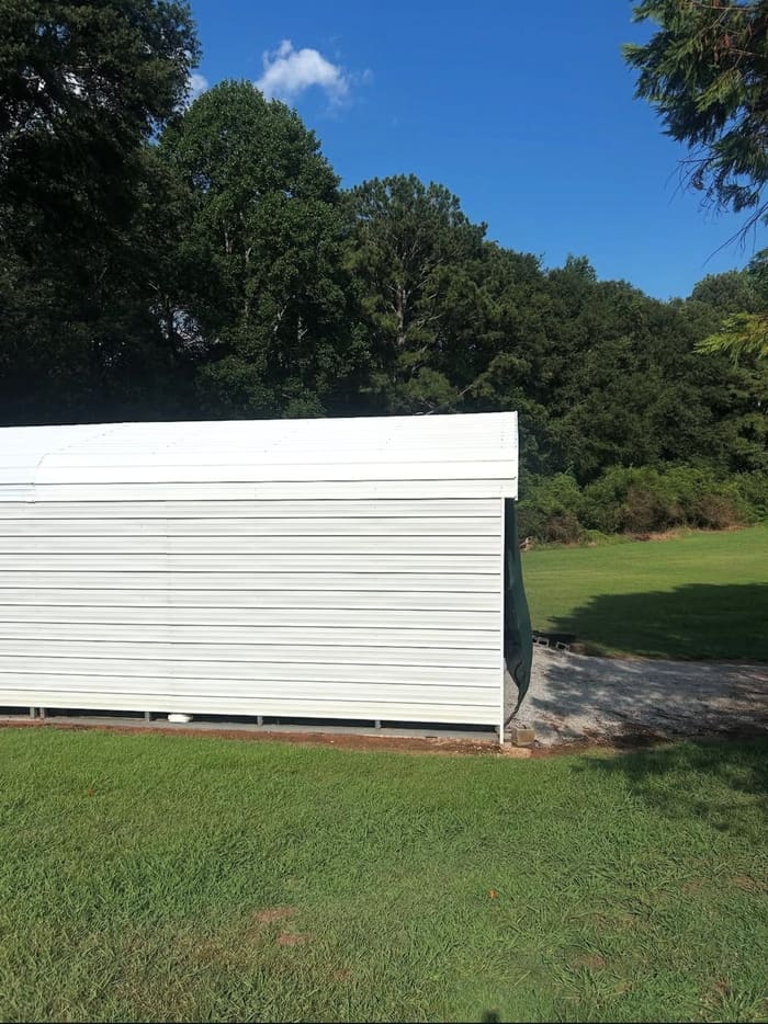 Clean white metal siding after washing in Athens, GA