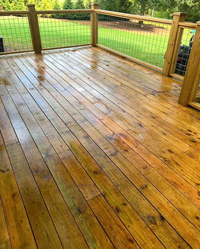 Restored natural wood deck after deck cleaning in Athens, GA